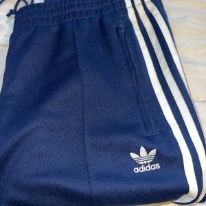 Navy blue adidas track pants